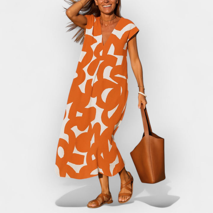 Lagana Haljina sa V Izrezom i Modernim Printom